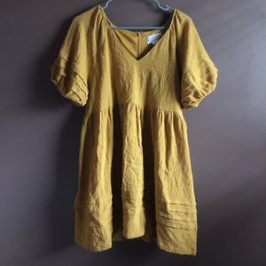 Loveriche brand mustard yellow dress with ruffle sleeves.